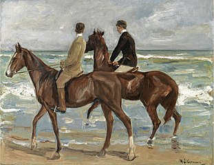 Dwóch jeźdźców na plaży